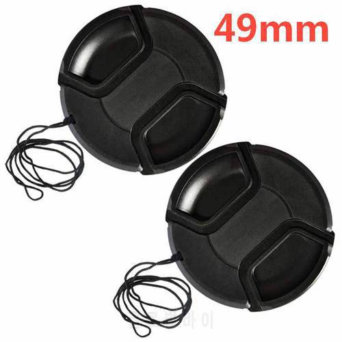 wholesale 30pcs/lot 49mm center pinch Snap-on cap cover for all camera 49mm Lens