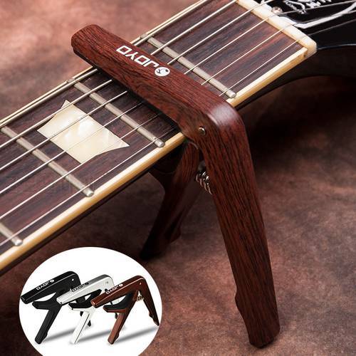 ABS Plastic Guitar Capo Clamp with Picks for 6 String Guitars Folk Pop Wood Guitar Ukulele Parts & Accessories JOYO JCP-01 Capos