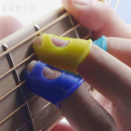 4pcs/set Guitar Silicone Fingertip Protector Gel Finger Guards Guitarra Strings Fingerguards Thumb Finger Nail Protect Cover Hot