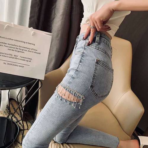 2022 New fashion Spring Summer Fashion Streetwear Thigh Cut Diamonds Tassel Skinny Jeans Women Denim Pants KZ566