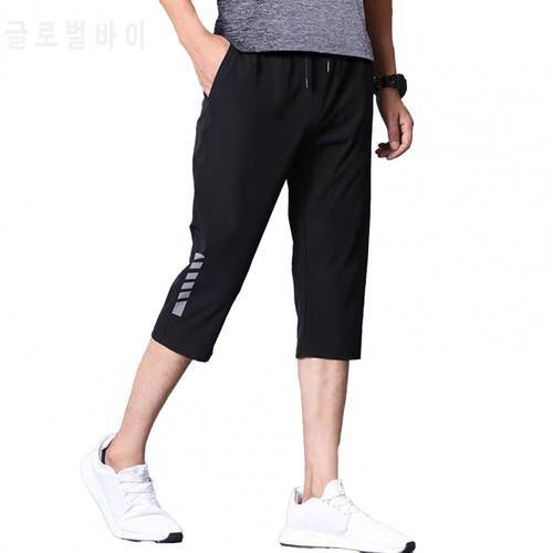 75% Hot Sales3/4 Capri Pants Solid Color Stretchy Men Drawstring Pockets Cropped Trousers for Sports