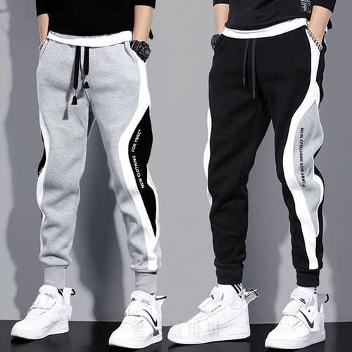 Men&39s plus size wide loose nine-point sports pants Korean version of the new casual sports student sports tie-foot men&39s pants