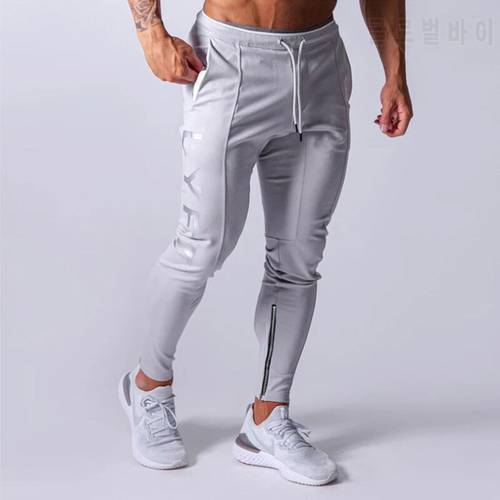 Men&39s fashion printed sportswear pants gym running training patchwork elastic small feet sweatpants
